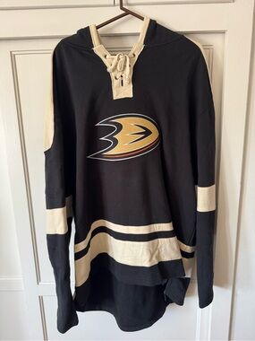 NHL Black and Cream Lace-Up Crewneck Pullover